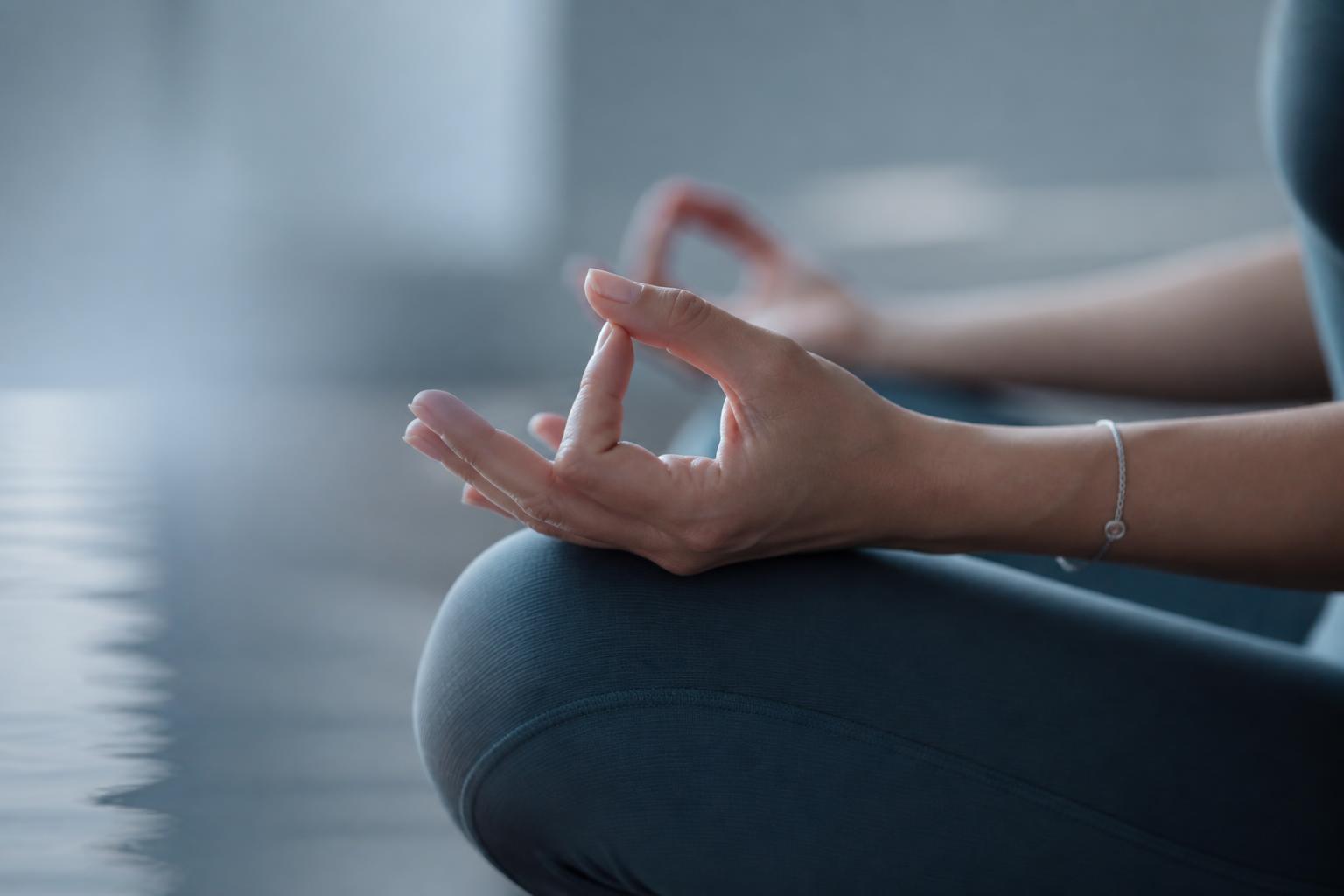 Woman seated in meditation